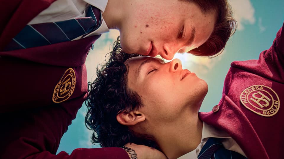 Image of Wilhelm and Simon cuddling from the Netflix series Young Royals.