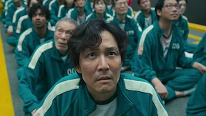 Still image from season 1, episode 4, of the Netflix series Squid Game, representing the transcript 'Stick to the Team'.