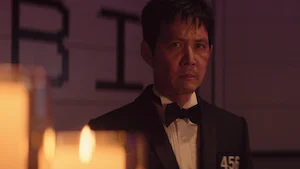 Still image from season 3, episode 4, of the Netflix series Squid Game, representing the transcript '222'.